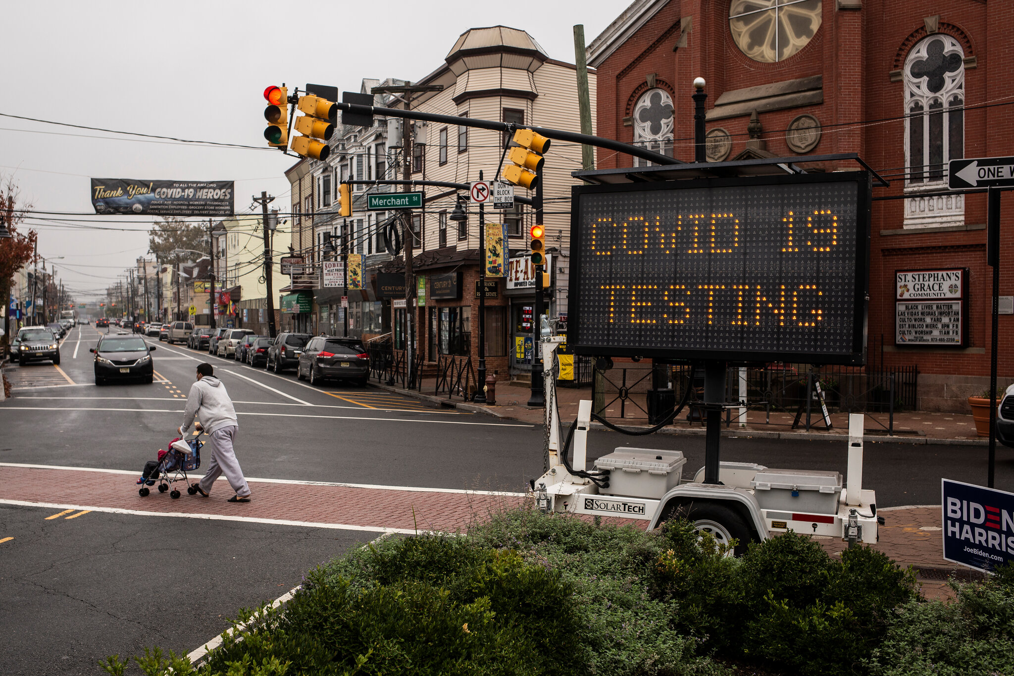 A sign on the side of a road that says covid 1 9 testing.